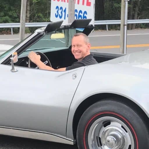 Kevin Garce driving a corvette