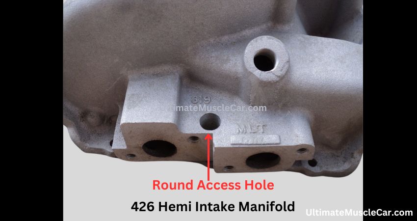 1966 426 Hemi intake manifold rear access hole.